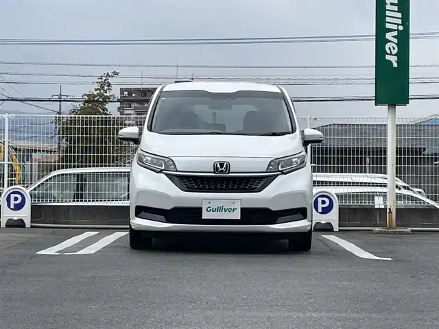 ホンダ フリード ハイブリット G ホンダセンシング 福岡県 2021(令3)年 4.6万km プラチナホワイトパール 純正7型SDナビ(フルセグTV/CD/DVD/Bluetooth)/ホンダセンシング/レーダークルコン/両側パワスラ/バックカメラ/コーナーセンサー/ETC/シートヒーター/純正LEDヘッドライト/純正フロアマット/スマートキー/プッシュスタート/ステアリングスイッチ/USBポート