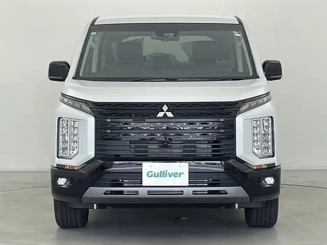 三菱 デリカＤ：５ シャモニー 群馬県 2025(令7)年 0.1万km未満 白Ⅱ 登録済未使用車(登録時走行距離7km)/オリジナルナビ取付パッケージ＋リアモニター取付パッケージ/＝＝＝＝＝＝＝＝＝＝＝＝/4WD/マルチアラウンドモニター/e-Assist/ ・衝突軽減ブレーキシステム/ ・車線逸脱警報システム/ ・レーダークルーズコントロールシステム/ ・オートマチックハイビーム/ ・誤発進抑制機能/ ・後側方車両検知警報システム/ ・後退時交差車両検知警報システム/エレクトリックテールゲート/両側パワースライドドア/パドルシフト/運転席側パワーシート/前席シートヒーター/ステアリングヒーター/電動パーキングブレーキ/オートブレーキホールド/プッシュスタート/スマートキー