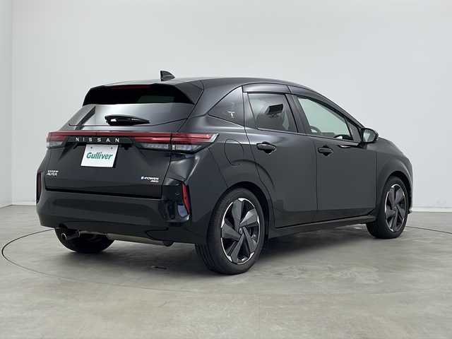 日産 オーラ G FOUR レザーエディション 新潟県 2022(令4)年 1.8万km 黒 純正メーカーオプションナビ/フルセグTV/ビルトインETC2.0/純正ドライブレコーダー/アラウンドビューモニター/プロパイロット/BOSEサウンドシステム/黒革シート/4WD/スマートキー/LEDヘッドライト/ハンドルヒーター/純正ドアバイザー/純正フロアマット/前席シートヒーター/スマートルームミラー/置くだけ充電/社外レーダー/お知らせリモコン