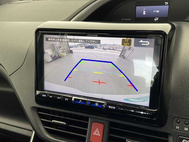 トヨタ ヴォクシー ハイブリッド ZS 煌Ⅲ 愛知県 2021(令3)年 3.7万km ホワイトパールクリスタルシャイン 衝突軽減システム/アルパイン製９型SDナビ/両側パワースライドドア/クルーズコントロール/シートヒーター/フルセグ/CD/DVD/Bluetooth/バックカメラ/コーナーセンサー/純正アルミホイール/LEDヘッドライト/リアオートエアコン/レーンキープアシスト/オートマチックハイビーム/ドライブレコーダー/ETC/ステアリングスイッチ/スマートキー/プッシュスタート