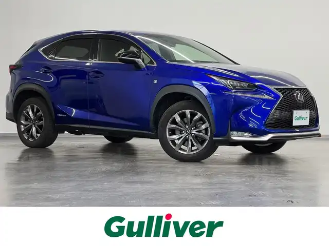 レクサス ＮＸ 300h Fスポーツ 三重県 2017(平29)年 5.8万km ヒートブルーコントラストレイヤリング ハイブリッド/FF/MTモード付フロアCVT/純正 7インチナビ/（AM/FM/CD/DVD/Blu-ray/SDREC/SD/USB/Bluetooth/VTR/AUX/TV）/バックガイドモニター＆助手席側サイドカメラ/【OP】“マークレビンソン” プレミアムサラウンドサウンドシステム/ビルトイン ETC2.0/安全/・【OP】プリクラッシュセーフティ［PCS］（ミリ波レーダー方式）/・【OP】レーダークルコン（全車速追従機能付）/・【OP】クリアランスソナー＆バックソナー/・車両接近通報装置/・タイヤ空気圧警告表示（TPMS）/装備/・【OP】パワーバックドア/・【OP】3眼フルLEDヘッドランプ/・Fスポーツ専用 本革スポーツシート（黒革）/・シートヒーター＆ベンチレーション（D/N）/・パワーシート（Dランバーサポート付8way・N8way）/・オートライト/・左右独立オートエアコン/・電子パーキングブレーキ＆オートブレーキホールド/・雨滴感応式フロントワイパー/・パドルシフト/・アクティブサウンドコントロール（ASC）/・ステアリングスイッチ/・自動防眩ルームミラー/・純正18inAW/・【OP】Fスポーツ専用色『ヒートブルーコントラストレイヤリング［8X1］』