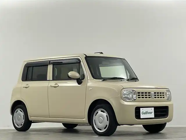スズキ ラパン G 埼玉県 2014(平26)年 6.8万km ミルクティーベージュメタリック ナビ　BT　フルセグ　CD　DVD　スペアキー　横滑り防止装置　アンチブレーキシステム　盗難防止システム　　AC　ハロゲンヘッドライト　ダブルエアバッグ