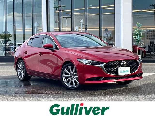 マツダ マツダ３セダン 15S ツーリング 新潟県 2021(令3)年 4.1万km ソウルレッドクリスタルM 純正ナビ/（フルセグ/DVD/Bluetooth）/ワンオーナー/冬タイヤ積載/衝突軽減/レーダークルーズコントロール/レーンキープアシスト/バックカメラ/コーナーセンサー/BSM/ビルドインETC/ドライブレコーダー/フロアマット/LEDヘッドライト/オートハイビーム/ウィンカーミラー/電格ミラー/スペアキー×１