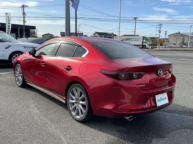 マツダ マツダ３セダン 15S ツーリング 新潟県 2021(令3)年 4.1万km ソウルレッドクリスタルM 純正ナビ/（フルセグ/DVD/Bluetooth）/ワンオーナー/冬タイヤ積載/衝突軽減/レーダークルーズコントロール/レーンキープアシスト/バックカメラ/コーナーセンサー/BSM/ビルドインETC/ドライブレコーダー/フロアマット/LEDヘッドライト/オートハイビーム/ウィンカーミラー/電格ミラー/スペアキー×１