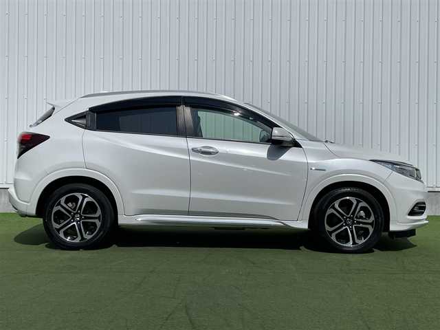 ホンダ ヴェゼル ハイブリッド Z ホンダセンシング 香川県 2019(令1)年 1.9万km プラチナホワイトパール 登録時走行距離：18690km/純正8インチSDナビゲーション/→フルセグTV/→CD/DVD再生/バックカメラ/ビルトインETC/ドライブレコーダー/レーダークルーズコントロール/LEDオートライト/フォグランプ/純正17インチアルミホイール/ステアリングリモコン/パドルシフト/スマートキー/プッシュスタート/純正マット