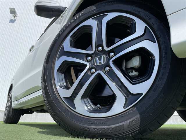ホンダ ヴェゼル ハイブリッド Z ホンダセンシング 香川県 2019(令1)年 1.9万km プラチナホワイトパール 登録時走行距離：18690km/純正8インチSDナビゲーション/→フルセグTV/→CD/DVD再生/バックカメラ/ビルトインETC/ドライブレコーダー/レーダークルーズコントロール/LEDオートライト/フォグランプ/純正17インチアルミホイール/ステアリングリモコン/パドルシフト/スマートキー/プッシュスタート/純正マット