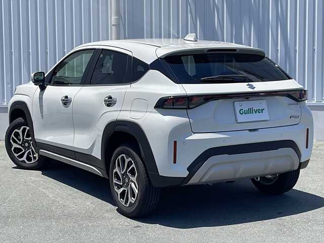 スズキ フロンクス 三重県 2025(令7)年 0.3万km アークティックホワイトパール 純正9型スマートフォン連携メモリーナビ(AM/FM/TV/BT)/フルセグTV/全周囲カメラ/前後ドライブレコーダー/ワイヤレス充電器/HDMI/BSM/前席シートヒーター/ETC/レーダークルーズコントロール/オートハイビーム/スペアキー/ヒーテッドドアミラー/コーナーセンサー/衝突軽減ブレーキ/レーンキープアシスト/横滑り防止/寒冷地仕様/革巻きステアリング/アイドリングストップ/パドルシフト/ダウンヒルアシストコントロール/電子パーキング/純正フロアマット/USB給電ポート/ワンオーナー/電動格納ミラー/禁煙車