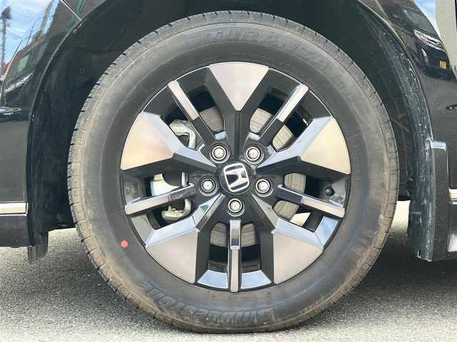 ホンダ ステップワゴン スパーダ eHEV 静岡県 2024(令6)年 0.5万km クリスタルブラックパール エンジンスタートボタン/パワーウィンドウ/パワーステアリング/パドルシフト/アイドリングストップ/スマートキー/スペアキー/Wオートエアコン/クルーズコントロール/ETC2.0/USB入力端子/全方位カメラ/純正11.4インチナビ（CD/DVD/BT/フルセグ）/三列シート/オットマン/電動リアゲート/純正ドライブレコーダー前後/ウォークスルー/純正フロアマット/純正アルミホイール/両側パワースライドドア/ハーフレザー/D席N席シートヒーター/ABS/横滑り防止装置/コーナーセンサー前後/レーンキープアシスト/オートライト/オートマチックハイビーム/LEDヘッドライト/W＋サイドエアバック/衝突軽減システム/カーテンエアバック/BSM/ホンダセンシング