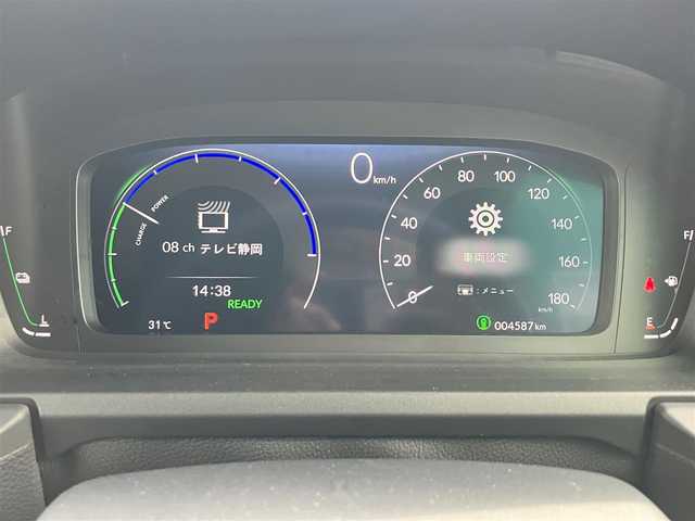 ホンダ ステップワゴン スパーダ eHEV 静岡県 2024(令6)年 0.5万km クリスタルブラックパール エンジンスタートボタン/パワーウィンドウ/パワーステアリング/パドルシフト/アイドリングストップ/スマートキー/スペアキー/Wオートエアコン/クルーズコントロール/ETC2.0/USB入力端子/全方位カメラ/純正11.4インチナビ（CD/DVD/BT/フルセグ）/三列シート/オットマン/電動リアゲート/純正ドライブレコーダー前後/ウォークスルー/純正フロアマット/純正アルミホイール/両側パワースライドドア/ハーフレザー/D席N席シートヒーター/ABS/横滑り防止装置/コーナーセンサー前後/レーンキープアシスト/オートライト/オートマチックハイビーム/LEDヘッドライト/W＋サイドエアバック/衝突軽減システム/カーテンエアバック/BSM/ホンダセンシング