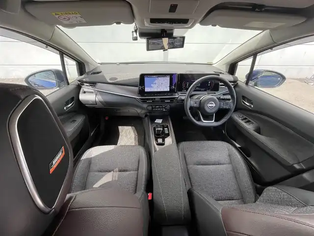 日産 オーラ G 千葉県 2022(令4)年 1.9万km オーロラフレアブルーパール ワンオーナー/純正ナビ/(USB/BT/HDMI/AppleCarplay/フルセグTV)/プロパイロット/レーダークルーズコントロール/BOSEサウンドシステム/全方位カメラ/置くだけ充電/ブラインドスポットモニター/レーンキープアシスト/ハンドル支援/駐車支援/デジタルインナーミラー/レザーシート/D/N席シートヒーター/ステアリングヒーター/ステアリングスイッチ/ビルトインETC2.0/純正ドアバイザー/純正フロアマット/オートマチックハイビーム/オートライト/取扱説明書/保証書/スペアキー×１
