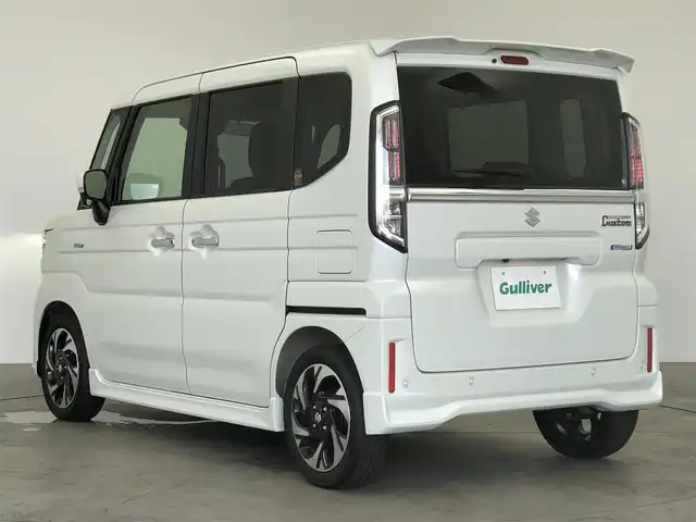 スズキ スペーシア カスタム HYBRID XS 愛知県 2024(令6)年 0.4万km ピュアホワイトP スズキセーフティサポート/　　・デュアルセンサーブレーキサポート/　　・車線維持支援機能/　　・車線逸脱抑制機能　　/　　・ふらつき警報機能/　　・アダプティブクルーズコントロール/　　・ハイビームアシスト/　　・全方位モニター/　　・ヘッドアップディスプレイ/メーカーオプション9インチナビ/　　・BT/フルセグ/革巻きステアリング/ステアリングリモコン/ステアリングヒーター/ハーフレザーシート/シートヒーター（前席）/シートバックテーブル/両側パワースライドドア/純正LEDヘッドライト/フォグランプ/純正15インチアルミホイール/取扱説明書/保証書