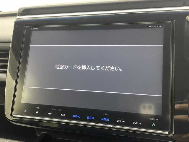 ホンダ ステップワゴン スパーダ ホンダセンシング 茨城県 2016(平28)年 7万km ホワイトオーキッドパール 純正9インチプレミアムインターナビ/ワンセグ/CD/DVD/Bluetooth/AM/FM/ホンダセンシング/・衝突軽減ブレーキ/・アダプティブ・クルーズ・コントロール/・車線維持支援システム/・路外逸脱抑制機能/・誤発進抑制機能/・先行車発進お知らせ機能/・標識認識機能/エアロ(フロント/サイド)/バックカメラ/フリップダウンモニター/LEDヘッドライト/オートライト/Clazziシートカバー