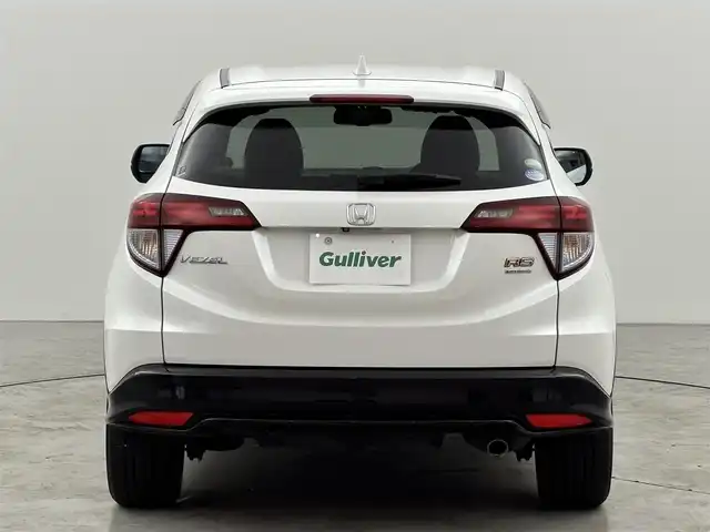 ホンダ ヴェゼル ハイブリッド RS ホンダセンシング 福岡県 2016(平28)年 6.3万km ホワイトオーキッドパール 純正ナビ（フルセグＴＶ）　/バックカメラ　/ホンダセンシング　/ＲＦＰ　/車両接近通報装置　/フロントガラス熱線　/エコモード　/横滑り防止　/ＥＴＣ　/ドラレコ　/純正１８インチアルミホイール　/純正フロアマット　/ＬＥＤ