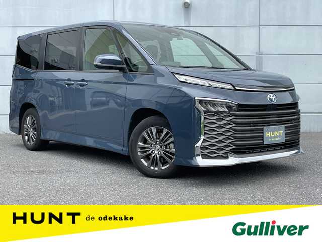 トヨタ ヴォクシー ハイブリッド S－G 千葉県 2022(令4)年 2.8万km マッシブグレー トヨタセーフティセンス/・衝突軽減ブレーキ/レーンキープアシスト/・レーダークルーズコントロール/オートハイビーム/・クリアランスソナー/ディスプレイオーディオプラス/・フルセグ/DVD/CD/BT/HDMI/USB/カープレイ/バックカメラ/ステアリングスイッチ/片側パワースライドドア/ETC2.0/電動パーキングブレーキ/ブレーキホールド/LEDヘッドライト/オートライト/スマートキー/プッシュスタート/純正フロアマット/純正16インチAW