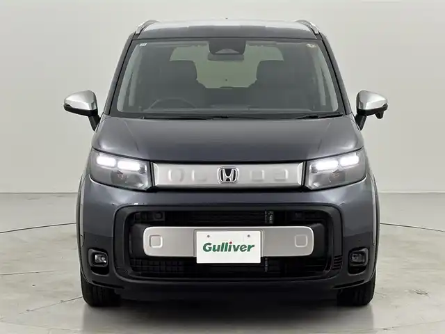 ホンダ フリード ハイブリット e:HEV クロスター 福岡県 2025(令7)年 0.1千km メテオロイドグレーメタリック 登録済未使用車　/純正ナビ／フルセグＴＶ　/バックカメラ　/レーダークルコン　/コーナーセンサー　/衝突軽減ブレーキ　/レーンキープ　/アクセル踏み間違い防止　/ＢＳＭ　/両側電動スライドドア　/シートヒーター　/ＬＥＤ