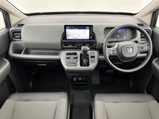 ホンダ フリード ハイブリット e:HEV クロスター 福岡県 2025(令7)年 0.1千km メテオロイドグレーメタリック 登録済未使用車　/純正ナビ／フルセグＴＶ　/バックカメラ　/レーダークルコン　/コーナーセンサー　/衝突軽減ブレーキ　/レーンキープ　/アクセル踏み間違い防止　/ＢＳＭ　/両側電動スライドドア　/シートヒーター　/ＬＥＤ