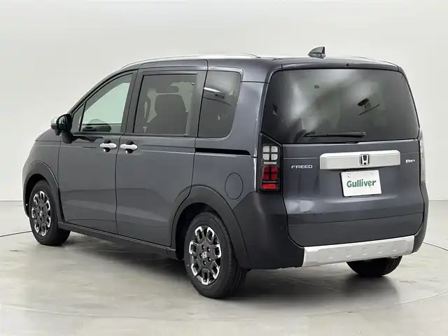 ホンダ フリード ハイブリット e:HEV クロスター 福岡県 2025(令7)年 0.1千km メテオロイドグレーメタリック 登録済未使用車　/純正ナビ／フルセグＴＶ　/バックカメラ　/レーダークルコン　/コーナーセンサー　/衝突軽減ブレーキ　/レーンキープ　/アクセル踏み間違い防止　/ＢＳＭ　/両側電動スライドドア　/シートヒーター　/ＬＥＤ