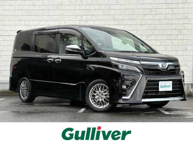 トヨタ ヴォクシー ハイブリッド ZS 煌Ⅲ 大阪府 2020(令2)年 5.8万km ブラック フリップダウンモニター/純正10型ナビ/バックカメラ/フルセグ/トヨタセーフティセンス/クリアランスソナー/シートヒーター/ハーフレザーシート/両側パワースライドドア/ビルトインETC/純正アルミホイール/LEDヘッドライト/スマートキー×2