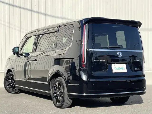 ホンダ ステップワゴン スパーダ eHEV 群馬県 2024(令6)年 1.6万km クリスタルブラックパール 純正SDナビ(LXM-247VFLI)/(CD/DVD/BT/MSU/HDMI/SD/USB)/フルセグ/ホンダセンシング/　・衝突軽減ブレーキ/　・踏み間違い衝突軽減システム/　・歩行者事故低減ステアリング/　・路外逸脱抑制機能/　・先行車発進お知らせ機能/　・標識認識機能/　・車線維持支援システム/クルーズコントロール/アラウンドビューモニター/ETC2.0/純正フリップダウンモニター/ブラインドスポットモニター/両側パワースライドドア/パーキングブレーキスイッチ/オートマチックブレーキホールド/電格ミラー/純正フロアマット/ドアバイザー/保証書/取扱説明書