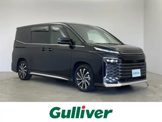 トヨタ ヴォクシー ハイブリッド S－Z 埼玉県 2025(令7)年 4万km グリッターブラックガラスフレーク 快適利便パッケージ　純正１０．５インチディスプレイオーディオ　バックカメラ　ビルトインＥＴＣ２．０　ＤＶＤ再生　三眼　レーダークルーズ　シートヒーター　ステアリングヒーター　ＨＤＭＩ　ＡＣ１００Ｖ