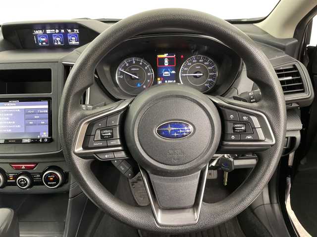 スバル インプレッサ Ｇ４ 1．6i－L アイサイト 道央・札幌 2019(令1)年 5.8万km ダークブルーパール ・4WD　/アイサイト/・プリクラッシュセーフティ/・社外ナビ　BT/SD/FM/AM/・バックカメラ/・レーダークルーズコントロール/・コーナーセンサー/・パドルシフト/・ビルトインETC/・スマートキー×2/・純正フロアマット/・オートライト/・横滑り防止装置/・ABS/・保証書/取説