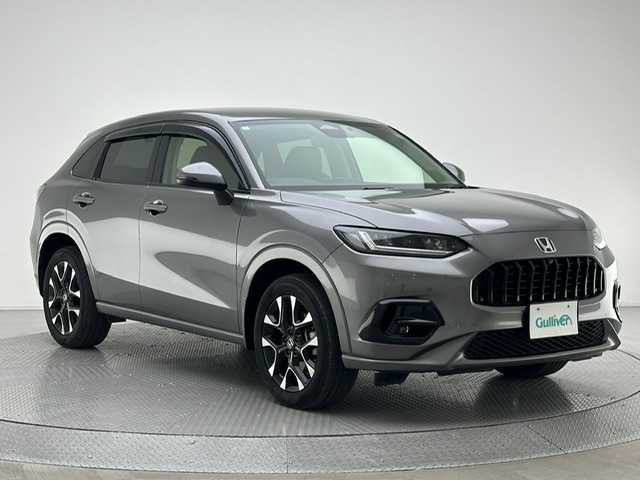 ホンダ ＺＲ－Ｖ ハイブリッド e:HEV Z 兵庫県 2024(令6)年 0.8万km スーパープラチナグレーメタリック 純正メモリナビ(Bluetooth/フルセグ/USB/applecarplay/androidauto)/パワーシート(D+N席)/シートヒーター(D+N席)/メモリーシート/ステアリングヒーター/BOSEサウンド/パワーバックドア/追従型クルーズコントロール/電子パーキングブレーキ/ブレーキホールド/前後ドライブレコーダー/ビルトインETC2.0/純正18インチアルミホイール/純正フロアマット/置くだけ充電/ブラインドスポットモニター/オートライト/オートマチックハイビーム/LEDヘッドライト/LEDフォグライト