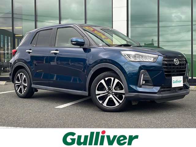 ダイハツ ロッキー G 福岡県 2020(令2)年 6.5万km レーザーブルークリスタルシャイン スマートアシストIII/・プリクラッシュセーフティ/・アクセル踏み間違い防止装置/・アダプティブクルーズコントロール/・レーンキープアシスト/純正9インチディスプレイオーディオ/【Applecarplay・Bluetooth・フルセグTV・USB】/パノラミックビューモニター/前後ドライブレコーダー/レザー調シートカバー/レザー調ハンドルカバー/シートヒーター/ビルトインETC/プッシュスタート/・スマートキー/LEDライト/・オートライト/・フォグランプ/純正フロアマット