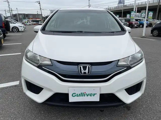 ホンダ フィット 13G Fパッケージ 石川県 2015(平27)年 8.5万km パール 純正メモリーナビ/バックカメラ/スマートキー/プッシュスタート/電動ミラー/ABS/社外アルミホイール&スタッドレス/純正ホイール&夏タイヤ積み込み/ステアリングリモコン