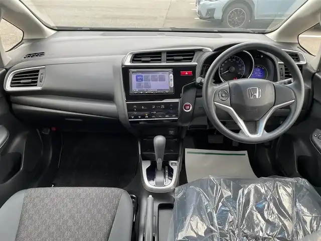 ホンダ フィット 13G Fパッケージ 石川県 2015(平27)年 8.5万km パール 純正メモリーナビ/バックカメラ/スマートキー/プッシュスタート/電動ミラー/ABS/社外アルミホイール&スタッドレス/純正ホイール&夏タイヤ積み込み/ステアリングリモコン