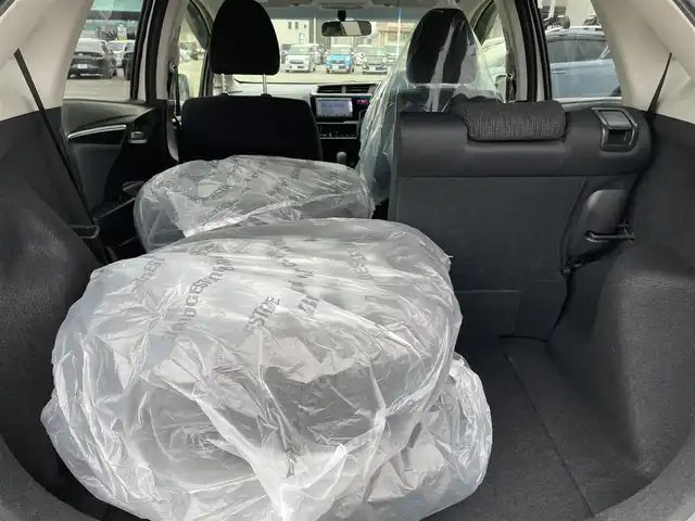 ホンダ フィット 13G Fパッケージ 石川県 2015(平27)年 8.5万km パール 純正メモリーナビ/バックカメラ/スマートキー/プッシュスタート/電動ミラー/ABS/社外アルミホイール&スタッドレス/純正ホイール&夏タイヤ積み込み/ステアリングリモコン