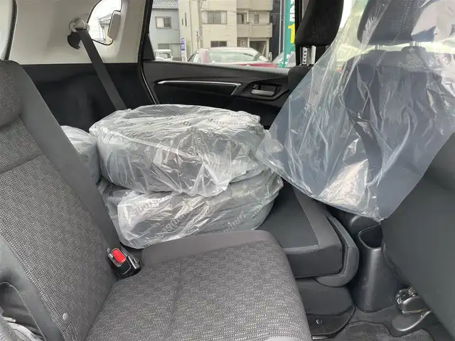 ホンダ フィット 13G Fパッケージ 石川県 2015(平27)年 8.5万km パール 純正メモリーナビ/バックカメラ/スマートキー/プッシュスタート/電動ミラー/ABS/社外アルミホイール&スタッドレス/純正ホイール&夏タイヤ積み込み/ステアリングリモコン
