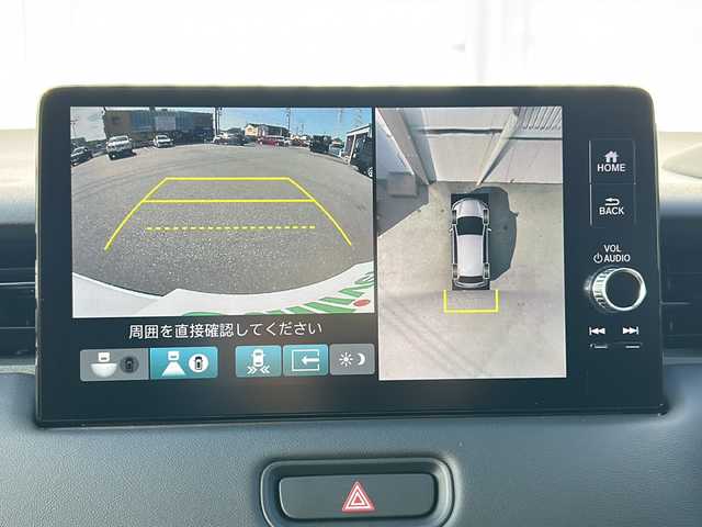 ホンダ ヴェゼル ハイブリッド e:HEV Z 三重県 2025(令7)年 0.1千km プラチナホワイトパール 登録済未使用車 /純正ナビ /全周囲カメラ/BSM /ビルトインETC2.0 /ワイヤレス充電器 /パワーバックドア /前席シートヒーター /USB・タイプC 給電/スペアキー /コーナーセンサー /ハーフレザーシート/ダウンヒルアシストコントロール/レーダークルーズコントロール/レーンキープアシスト/衝突軽減ブレーキ/電子パーキング/LEDヘッドライト/オートハイビーム/オートライト/革巻きステアリング/ステアリングスイッチ/電動格納ミラー/禁煙車