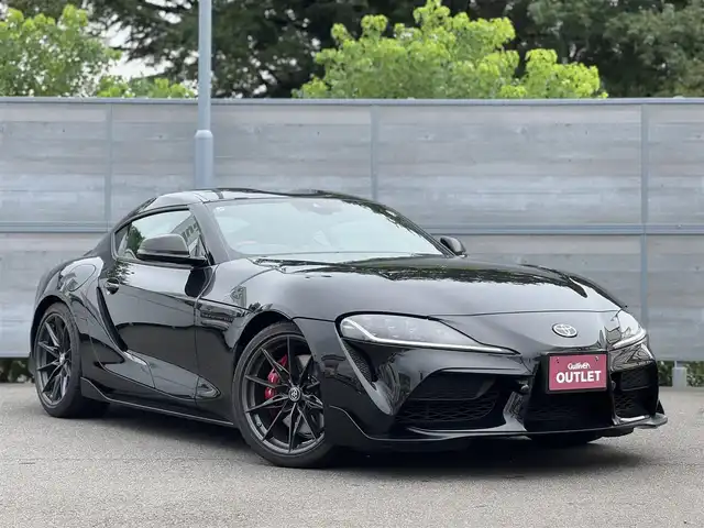 トヨタ スープラ RZ 三重県 2025(令7)年 0.1万km ブラックメタリック ワンオーナー/プリクラッシュセーフティ/HDDナビゲーションシステム/・8.8インチタッチディスプレイ/・地デジTV/・HDDオーディオ/・Toyota Supra Connect/・Bluetooth/JBLプレミアムサウンドシステム(12スピーカー)/バックモニター/リアクロストラフィックアラート/クルーズコントロール/レーンディパーチャーアラート/ブラインドスポットモニター/ブラック/レッドツートーンアルカンターラ/革コンビシート/パワーシート/シートヒーター（前席）/カラーヘッドアップディスプレイ/USBポート/ETC/純正19インチ10本スポークツヤ消ダークメタリック塗装鍛造アルミホイール/「Supra」ロゴ入brembo製レッドブレーキキャリパー/6灯式LEDヘッドランプ/・オートライト/アダプティブハイビーム/プッシュエンジンスタート/スマートキー/新車時保証書/取扱説明書