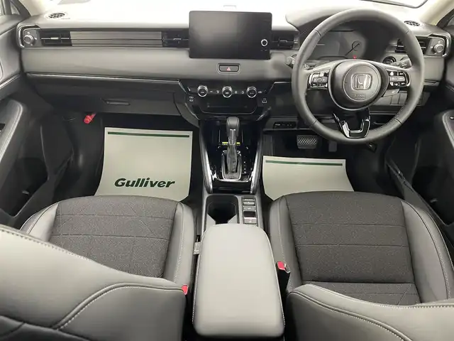 ホンダ ヴェゼル ハイブリッド e:HEV Z 埼玉県 2025(令7)年 0.1千km プラチナホワイトパール 登録済未使用車　純正９型ＤＡ　ＴＶ　ＢＴ　ＥＴＣ２．０　ＢＳＭ　バックカメラ　置くだけ充電　電動リアゲート　シートヒーター　ハーフレザーシート　ダウンヒルアシストコントロール　ハンドルヒーター