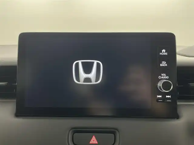 ホンダ ヴェゼル ハイブリッド e:HEV Z 埼玉県 2025(令7)年 0.1千km プラチナホワイトパール 登録済未使用車　純正９型ＤＡ　ＴＶ　ＢＴ　ＥＴＣ２．０　ＢＳＭ　バックカメラ　置くだけ充電　電動リアゲート　シートヒーター　ハーフレザーシート　ダウンヒルアシストコントロール　ハンドルヒーター