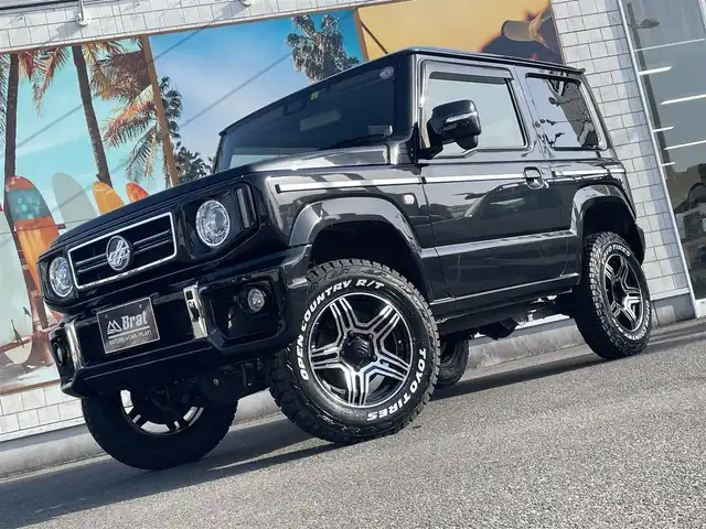 スズキ ジムニー XC 愛知県 2022(令4)年 1.8万km ブルーイッシュブラックパール3 AIS検査済み/【2409016473】/Little　G　キット（社外）/・フロントグリル/・フロントバンパー/・サイドモール/・G15エンブレム/・スペアタイヤカバー/新品タイヤ（グラバスジュニア）社外/新品アルミホイール（TOYOオープンカントリーR/T）社外/リフトアップキット（社外）/フロントカメラ（社外）/モニター（社外）/クリアサイドマーカー（社外）/LEDヘッドライト/ウィンカーミラー/スズキセーフティーサポート/アイドリングストップ/ヘッドライトウォッシャー/革巻きステアリング/ビルドインETC/純正フロアマット/カロッツェリアナビ/ダウンヒルアシストコントロール/前席シートヒーター/社外パーツ取り付けあり