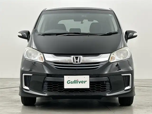 ホンダ フリード ハイブリット ジャストセレクション 福岡県 2014(平26)年 10.3万km プレミアムスパークルブラックパール フリップダウンモニター/純正ナビ/・CD/DVD/BT/フルセグ/バックカメラ/両側パワースライドドア/クルーズコントロール/ETC/ドライブレコーダー/キセノンライト/横滑り防止