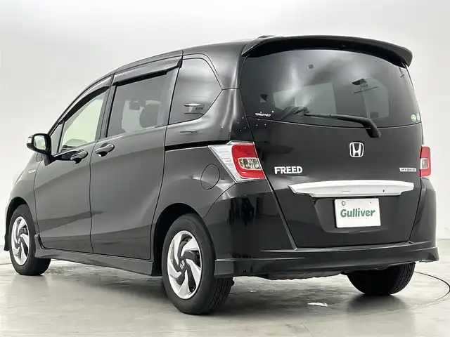 ホンダ フリード ハイブリット ジャストセレクション 福岡県 2014(平26)年 10.3万km プレミアムスパークルブラックパール フリップダウンモニター/純正ナビ/・CD/DVD/BT/フルセグ/バックカメラ/両側パワースライドドア/クルーズコントロール/ETC/ドライブレコーダー/キセノンライト/横滑り防止
