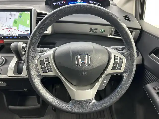 ホンダ フリード ハイブリット ジャストセレクション 福岡県 2014(平26)年 10.3万km プレミアムスパークルブラックパール フリップダウンモニター/純正ナビ/・CD/DVD/BT/フルセグ/バックカメラ/両側パワースライドドア/クルーズコントロール/ETC/ドライブレコーダー/キセノンライト/横滑り防止
