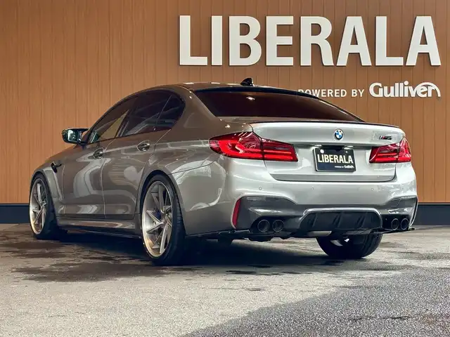 ＢＭＷ Ｍ５ 宮城県 2018(平30)年 6万km ドニントングレーM Bowers&Wilkinsサウンドシステム/MAXTON DESIGNエアロ/HyperForged21インチAW/ヘッドアップディスプレイ/アクティブクルーズコントロール/レーンキープアシスト/レーンデチェンジウォーニング/iDriveナビゲーションシステム/フルセグTV/トップビューカメラ/ブラウンハーフレザーシート/シートベンチレーション/シートヒーター/４ゾーンエアコン/カーボンルーフ/ドライブレコーダー/コンフォートアクセス/パワートランク/LEDヘッドライト/オートマチックハイビーム