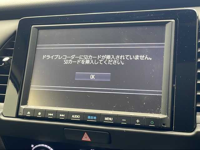ホンダ フィット e:HEVホーム 沖縄県 2020(令2)年 6.6万km パール 純正８インチナビ　（VXM-205VFEi)/フルセグ　/ＤＶＤ　/Ｂｌｕｅｔｏｏｔｈ　/バックカメラ　/ＥＴＣ　/ドラレコ　/クルーズコントロール　/ステアスイッチ　/ハーフレザー　/スマートキー　/プッシュスタート　/レザーステアリング　/ＵＳＢ