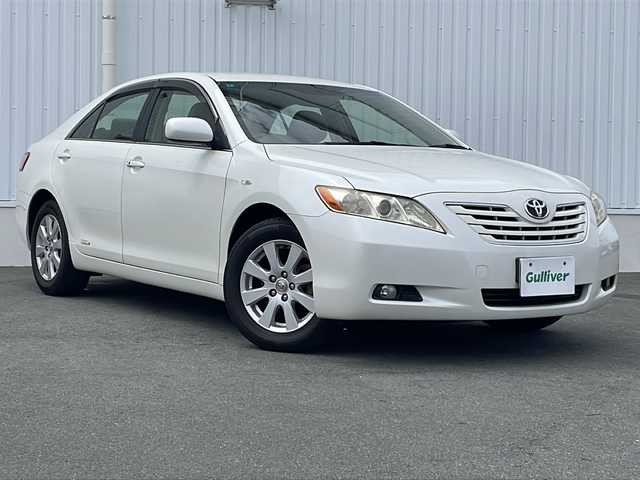 トヨタ カムリ G リミテッドエディション 三重県 2006(平18)年 5.1万km ホワイトパールクリスタルシャイン 純正ナビ/バックカメラ/ETC/クルーズコントロール/革巻きステアリング/前席パワーシート/ステアリングリモコン/オートライト/純正フロアマット/スペアキー/電動格納ミラー/禁煙車