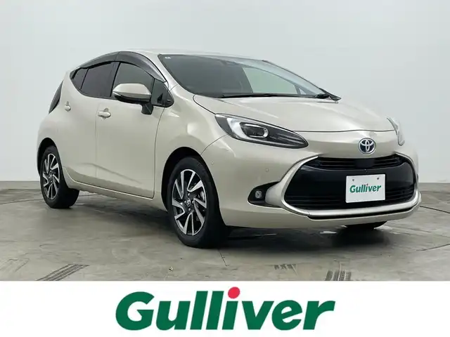 トヨタ アクア Z 岡山県 2022(令4)年 2.6万km クリアベージュメタリック 純正ディスプレイオーディオ/(Bluetooth/USB/Mira Cast)/パノラミックビューモニター/社外ドライブレコーダー前後/運転席パワーシート/前席シートヒーター/LEDオートヘッドライト/純正16インチAW/ブラインドスポットモニター/ヘッドアップディスプレイ/スマートキー×2/横滑り防止/ビルトインETC/取扱説明書