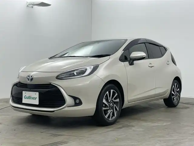トヨタ アクア Z 岡山県 2022(令4)年 2.6万km クリアベージュメタリック 純正ディスプレイオーディオ/(Bluetooth/USB/Mira Cast)/パノラミックビューモニター/社外ドライブレコーダー前後/運転席パワーシート/前席シートヒーター/LEDオートヘッドライト/純正16インチAW/ブラインドスポットモニター/ヘッドアップディスプレイ/スマートキー×2/横滑り防止/ビルトインETC/取扱説明書