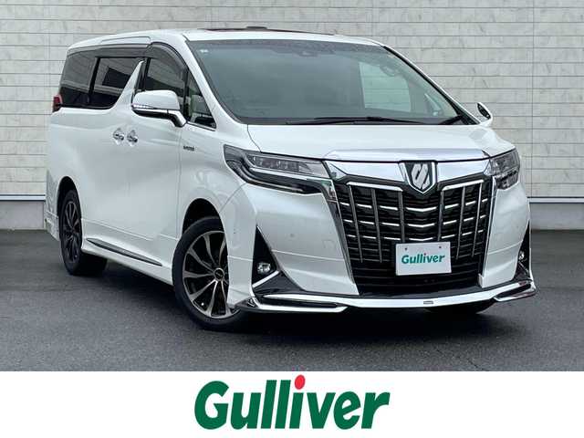 トヨタ アルファードハイブリット X 群馬県 2018(平30)年 6.6万km ホワイトパールクリスタルシャイン トヨタセーフティーセンス/・衝突軽減ブレーキ/・ブラインドスポット/・クリアランスソナー/・クルーズコントロール/・レーンキープ/・横滑り防止/・オートライト/・オートマチックハイビーム/・SOSコール/・デジタルインナーミラー/Ｔコネクト10.5インチナビ/・AM/FM/Bluetooth/・SD/USB/AUX/MSV/・フルセグTV/バックカメラ/JBLサウンド/両側電動スライドドア/フリップダウンモニター/サンルーフ/ドライブレコーダー/LEDヘッドライト/LEDフォグランプ/電動パーキング/純正フロアマット/純正ドアバイザー/社外18インチアルミホイール/プッシュスタート/スマートキー