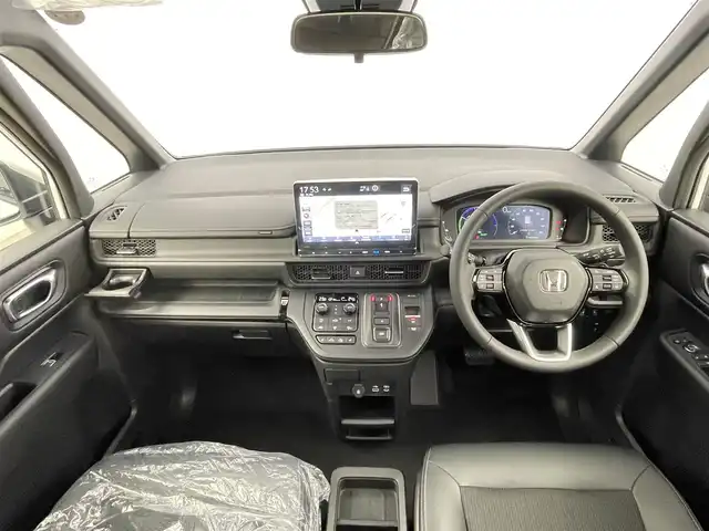 ホンダ ステップワゴン スパーダ eHEV 千葉県 2025(令7)年 0.1千km プラチナホワイトパール 登録済未使用車/HondaSENSING/・衝突軽減ブレーキ（CMBS）/・先行車発進お知らせ機能/・歩行者事故低減ステアリング/・路外逸脱抑制機能/・標識認識機能/・渋滞追従機能付アダプティブクルーズコントロール/・車線維持支援システム（LKAS）/・トラフィックジャムアシスト（渋滞運転支援機能）/・ブラインドスポットインフォメーション/・誤発進抑制機能/・後方誤発進抑制機能/・近距離衝突軽減ブレーキ/・急アクセル抑制機能/・パーキングセンサーシステム/・オートハイビーム/純正11.4インチメモリーナビ/・フルセグTV/・Bluetooth接続/・CD/DVD再生/・SD/MSV/・バックカメラ/両側パワースライドドア/LEDヘッドライト/コーナーセンサー/スマートキー
