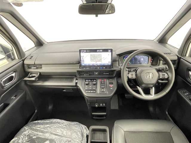 ホンダ ステップワゴン スパーダ eHEV 千葉県 2025(令7)年 0.1千km プラチナホワイトパール 登録済未使用車/HondaSENSING/・衝突軽減ブレーキ（CMBS）/・先行車発進お知らせ機能/・歩行者事故低減ステアリング/・路外逸脱抑制機能/・標識認識機能/・渋滞追従機能付アダプティブクルーズコントロール/・車線維持支援システム（LKAS）/・トラフィックジャムアシスト（渋滞運転支援機能）/・ブラインドスポットインフォメーション/・誤発進抑制機能/・後方誤発進抑制機能/・近距離衝突軽減ブレーキ/・急アクセル抑制機能/・パーキングセンサーシステム/・オートハイビーム/純正11.4インチメモリーナビ/・フルセグTV/・Bluetooth接続/・CD/DVD再生/・SD/MSV/・バックカメラ/両側パワースライドドア/LEDヘッドライト/コーナーセンサー/スマートキー