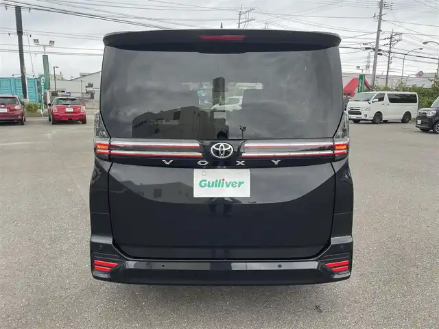 トヨタ ヴォクシー S－G 山形県 2022(令4)年 3.1万km グリッターブラックガラスフレーク 4WD/セーフティセンス/両側パワースライドドア/純正ナビ/　【BT USB Miracast Apps】/バックカメラ/ETC/前後ドライブレコーダー/ステアリングスイッチ/レーダークルーズコントロール/シートヒーター/オートホールド/横滑り防止装置/LEDライト/ウィンカーミラー/純正フロアマット/ドアバイザー/保証書、取説あり