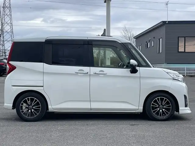 トヨタ ルーミー カスタムG－T 道央・札幌 2018(平30)年 6.6万km パールホワイトⅢ ４WD/純正ディーラーOPナビ/CD/DVD/BT/フルセグ/スマートアシスト/衝突被害軽減ブレーキ/横滑り防止装置/クルーズコントロール/レーンキープアシスト/リアコーナーセンサー/アラウンドビューモニター/ビルトインETC/ドライブレコーダー/アイドリングストップ/SPORTMODE/両側パワースライドドア/プッシュスタート/スマートキー/LEDヘッドライト/オートライト/フォグランプ/電動格納ミラー/ウィンカーミラー/純正フロアマット/ドアバイザー