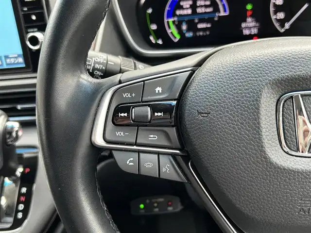 ホンダ オデッセイ ハイブリッド e:HEVアブソルート EX 島根県 2021(令3)年 1.8万km プレミアムスパークルブラックパール 登録時走行距離17207km/Honda純正ナビ（Gathers）/Bluetooth・Radio・CD・DVD/ETC2.0/デジタルインナーミラー（ALPINE）/フリップダウンモニター/Honda　SENSING/マルチビューカメラシステム/Hondaスマートパーキングアシスト/ブラインドスポットインフォメーション/LEDアクティブコーナリングライト/2列目プレミアムクレードルシート/運転席・助手席シートヒーター/運転席８ウェイパワーシート/助手席４ウェイパワーシート/運転席大型アームレスト/プライムスムース×ファブリックコンビシート/AC 100V 1500W/センターコンソールボックス/列目LEDアンビエントライトランプ/シーケンシャルターンシグナルランプ/ハンズフリーアクセスパワーテールゲート/両側パワースライドドア/20インチ社外AW